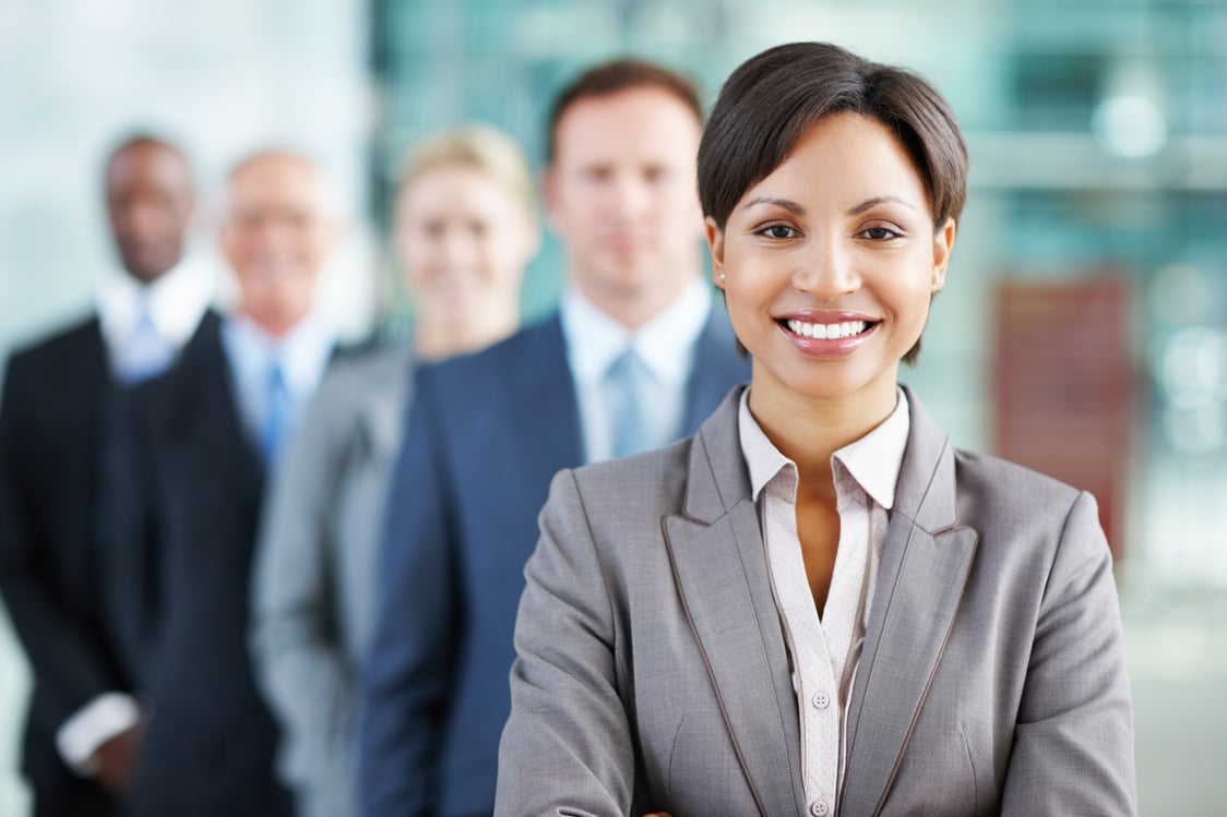 Female leader with business team